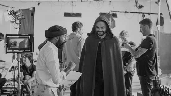 Sandeep directing an actor dressed in a wizard's cloak